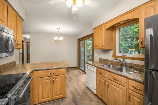 The over-the-sink kitchen window provides great views to your stunning backyard