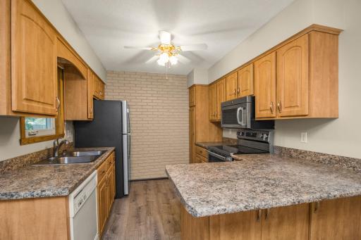 Beautiful counterspace is abundant and functional in your kitchen, complete with stainless steel appliances