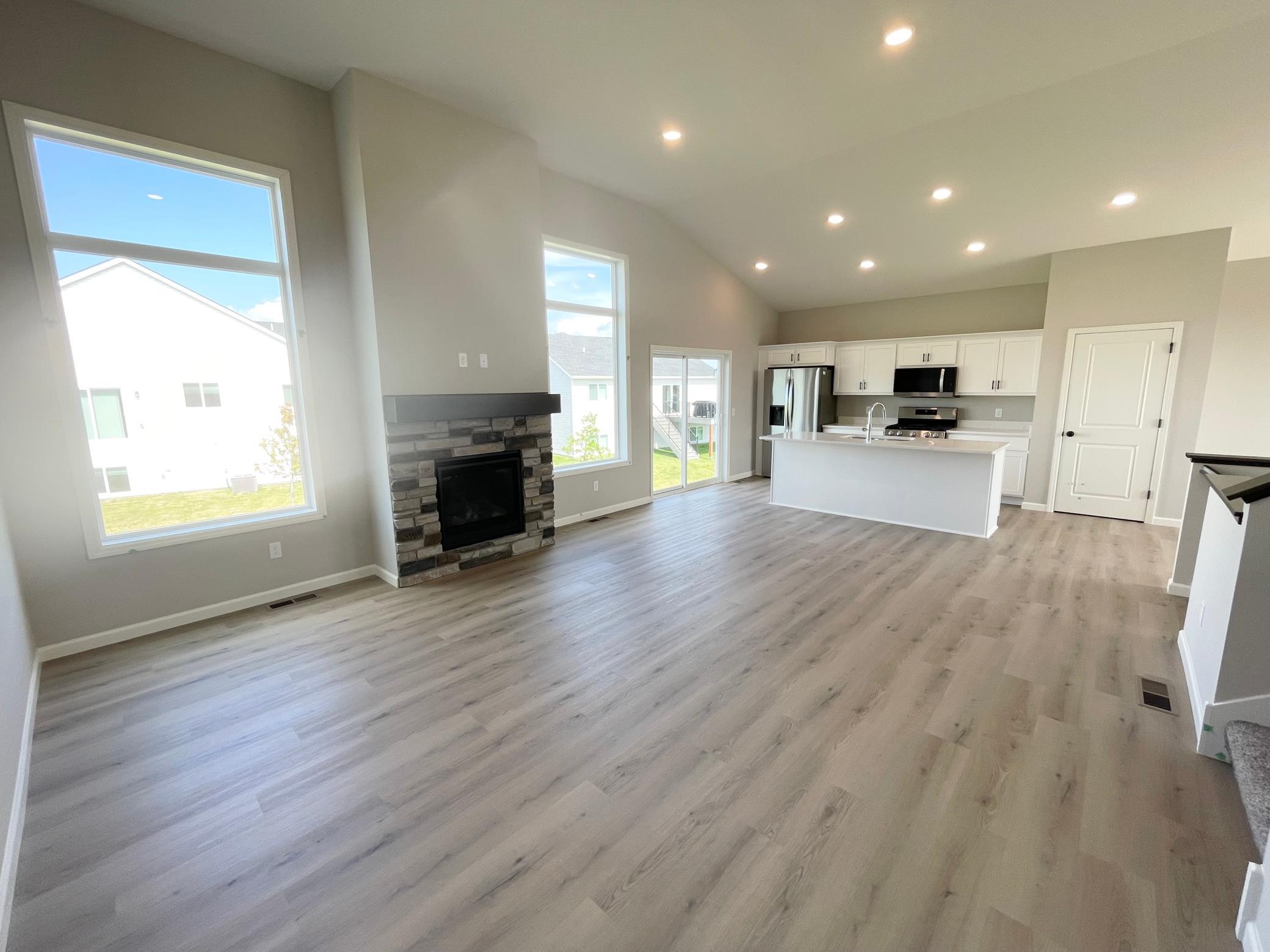 Actual home will have fireplace in basement, no stone. Photo shows the same floor plan but not the actual home. Photos of actual home will be uploaded when home has been completed and cleaned.