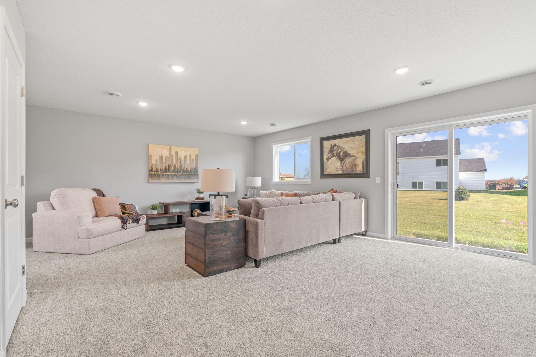 Actual home will have fireplace in basement, no stone. Photo shows the same floor plan but not the actual home. Photos of actual home will be uploaded when home has been completed and cleaned.