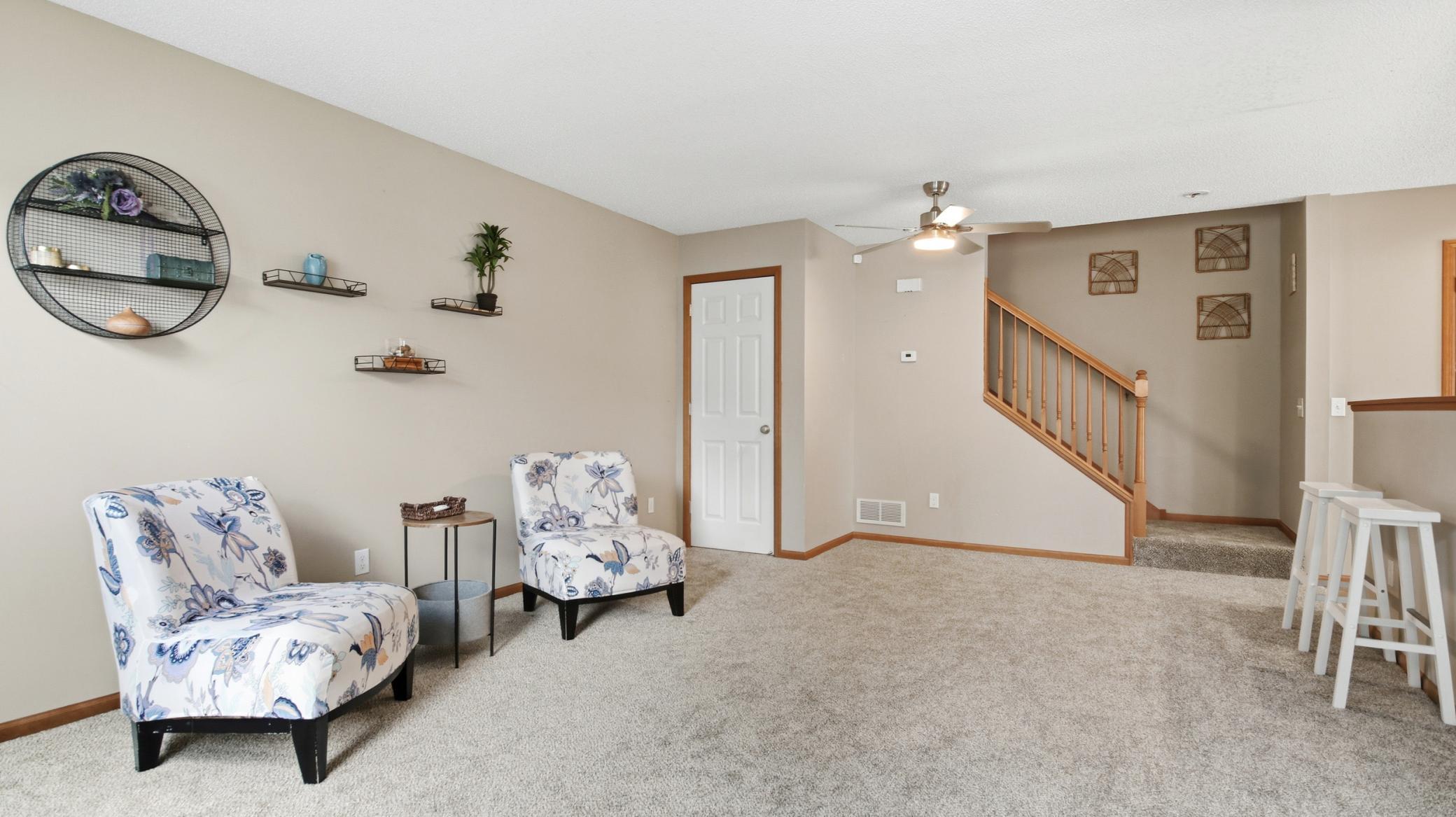 Step into the spacious combined living / dining room and enjoy newly installed carpet.