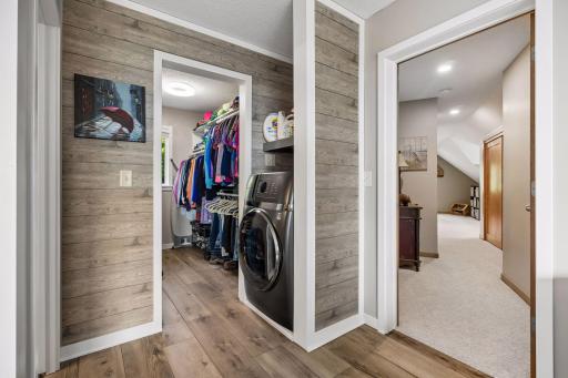 Primary walk-in closet with your own laundry