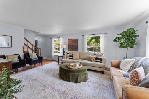 The home welcomes you with a bright living room.
