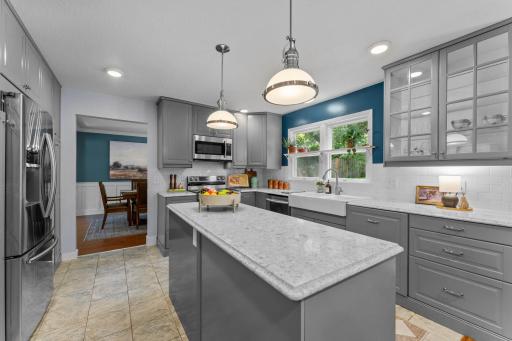 Several glass-front cabinets that offer the perfect place to display favorite dishes or dÃ©cor.