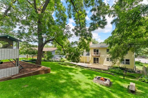 Outside is where this property truly shines. The backyard feels more like your own private park than a typical neighborhood lot.