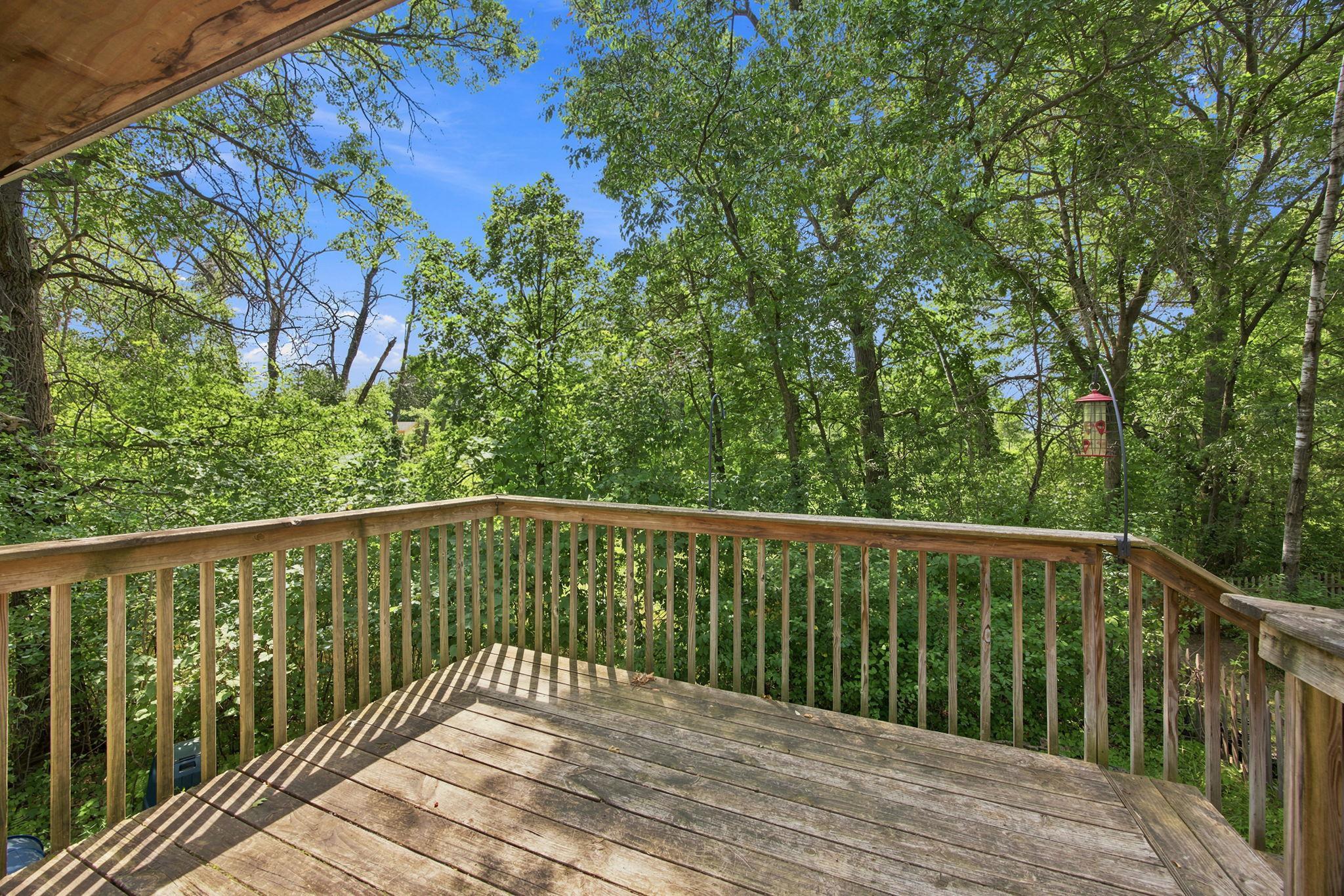 The deck offers a quiet place to enjoy morning coffee or summer evenings