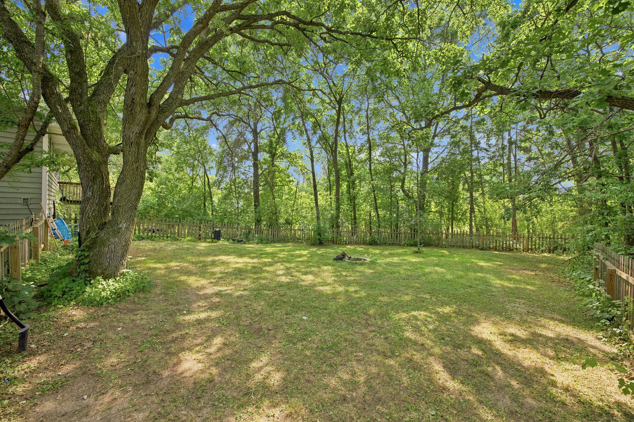 Plenty of yard space surrounded by mature trees and natural scenery