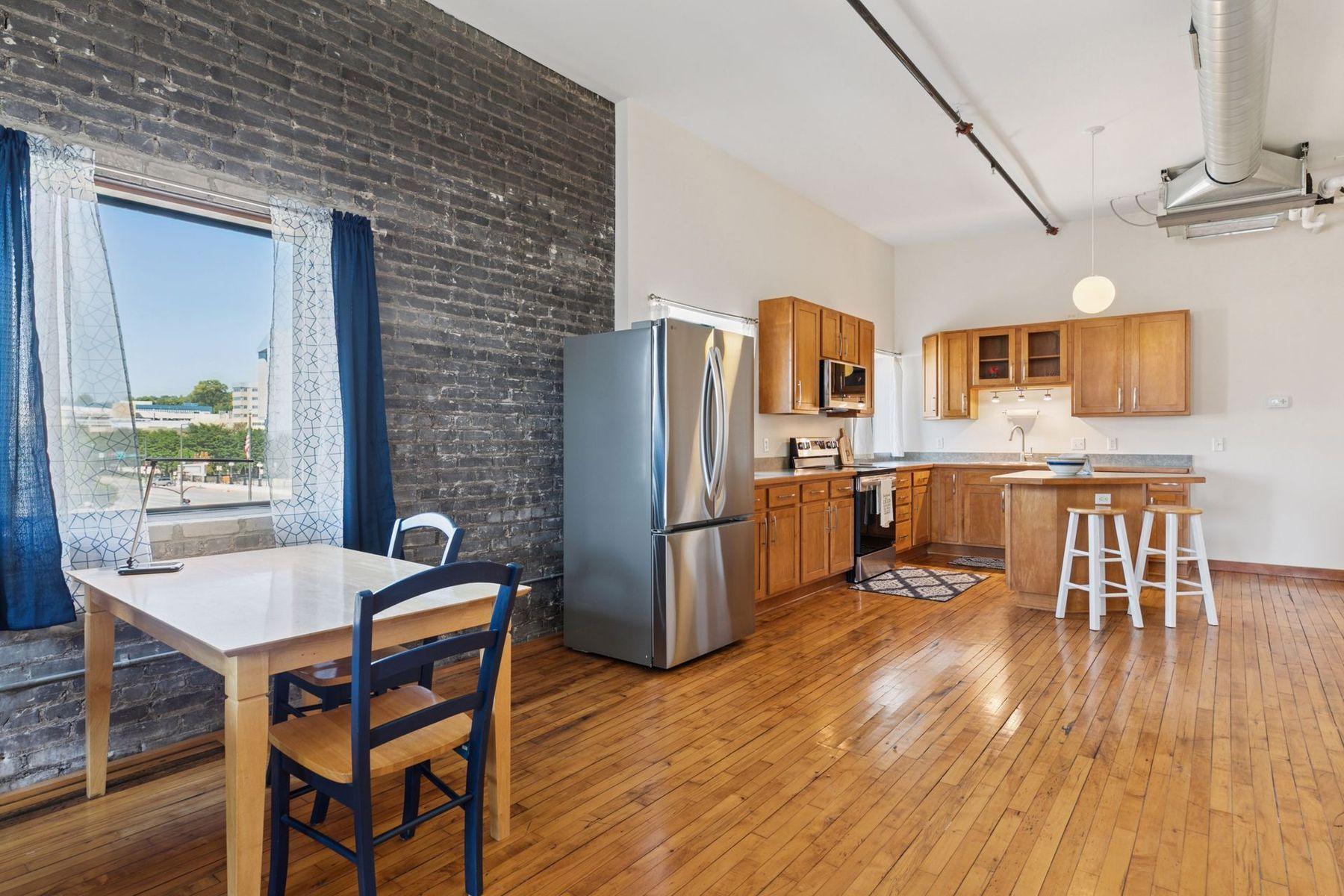 Space for dining adjacent to kitchen and windows