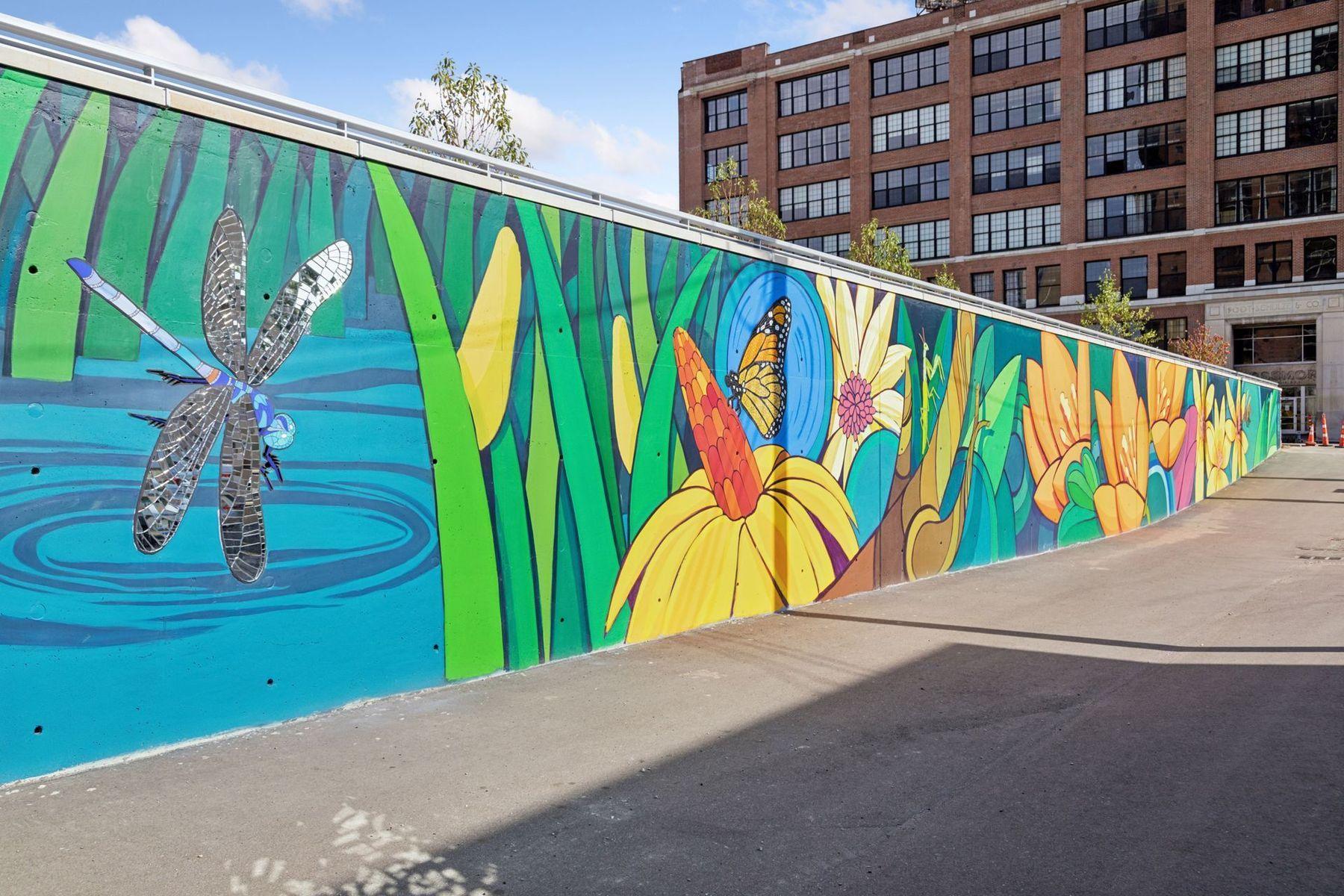 Colorful neighborhood murals add character and creative energy right outside your door.