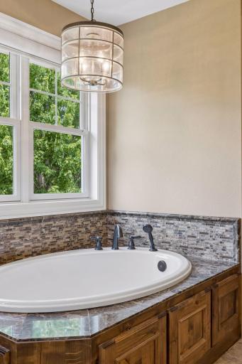 Relax your cares away in the deep soaking tub.