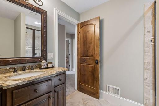 The upper level includes a convenient hallway 3/4 bathroom.