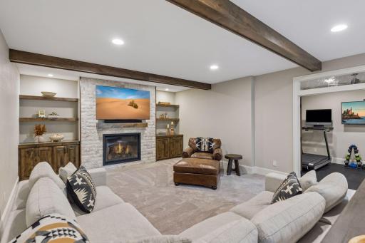 This view of the family room showcases the adjacent bonus room.
