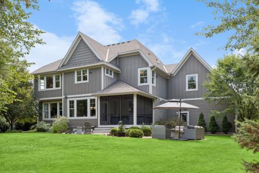 The beautifully landscaped backyard is perfect for entertaining with the screened porch and large stamped concrete patio. Maintain the yard effortlessly with built-in sprinkler system.
