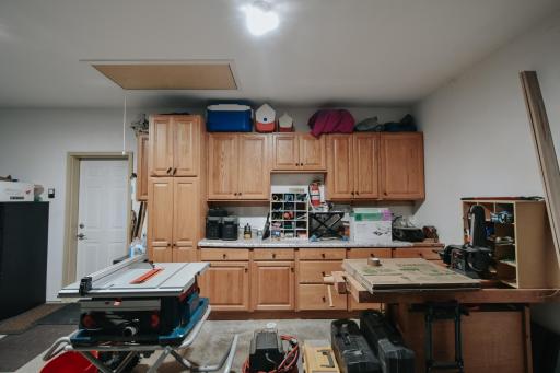 notice in the ceiling there are steps to come down for storage. Cabinets and counter tops stay with garage.