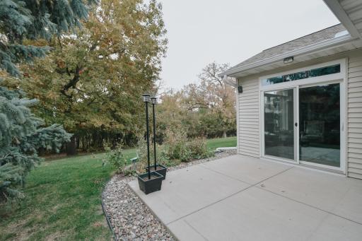 Back concrete patio; lots of nice trees. Private area.