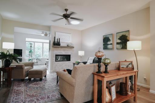 Enjoy the fireplace from the den or in the living room- the perks of a double sided fireplace!
