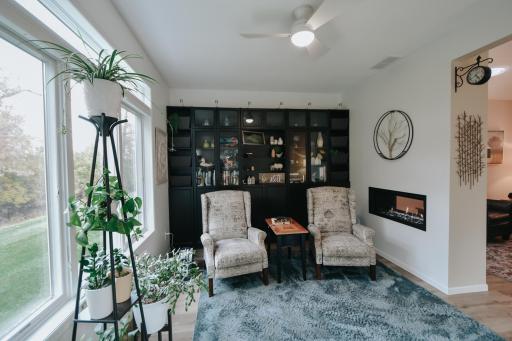 Den, library or sunroom- wonderful built in storage. Tons of natural light throughout with the large new patio door and the large windows looking into the back yard.