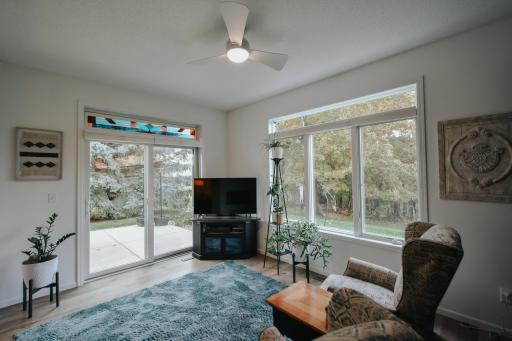 Patio where you can sit and enjoy some privacy and some nature. New patio door.