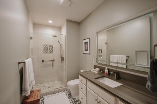 Spa like feel in the primary 3/4 bathroom with heated floors-