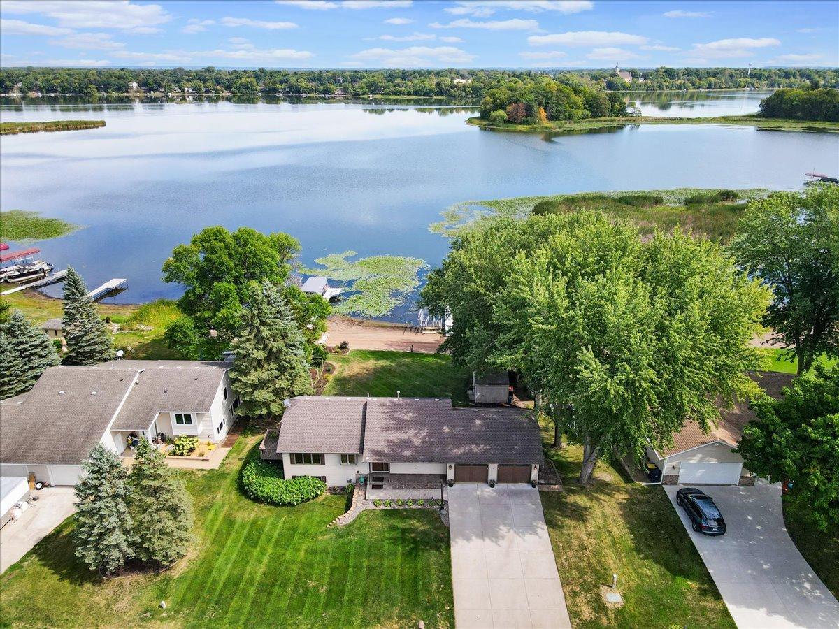 Your Place on North Center Lake Set between a peaceful neighborhood and the water, this Lindstrom lakefront home offers the best of both worlds.