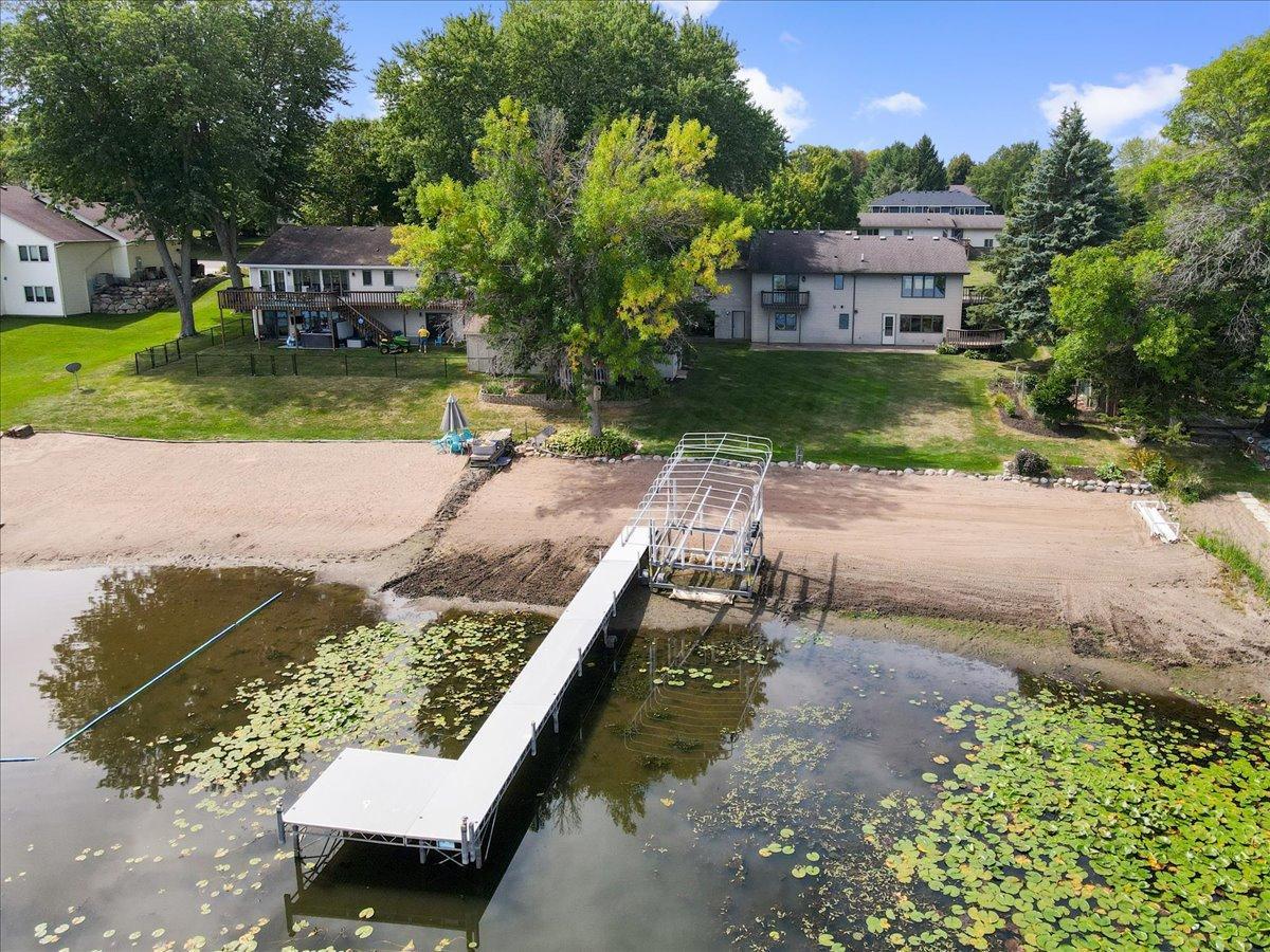 The Dock Is Ready for Lake Days Step from your sandy shoreline onto the included dock and begin another day on North Center Lake.