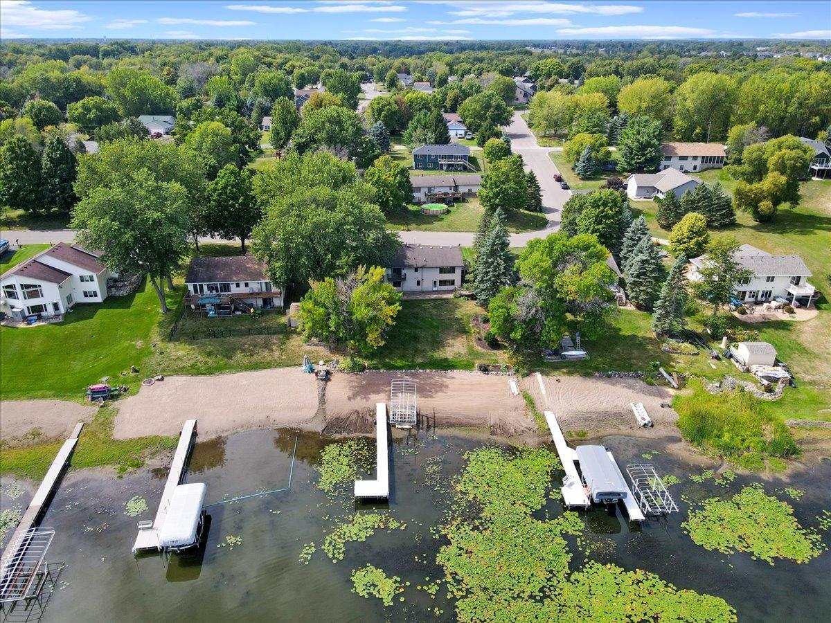 88 Feet of Sandy Shoreline The generous North Center Lake frontage provides space to swim, launch the boat, and make summers memorable.