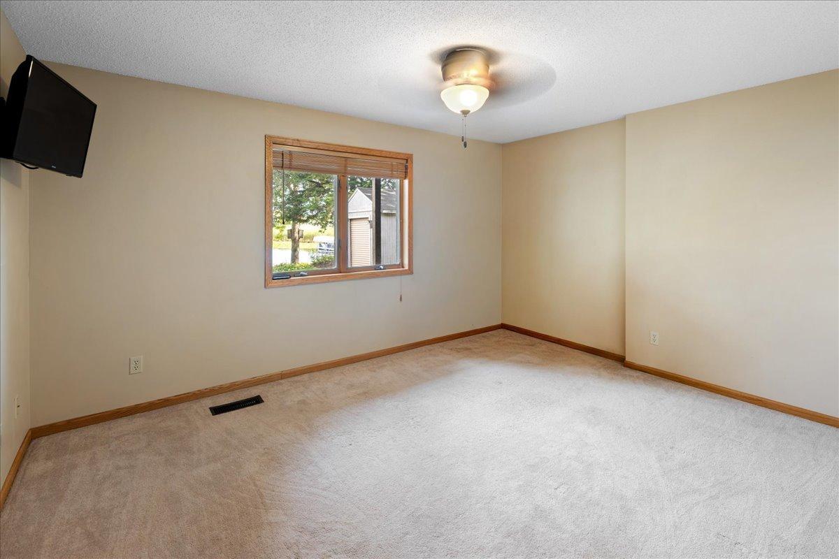 A Flexible Room Near the Lake Use this comfortable space as a bedroom, office, hobby room, or quiet retreat with a glimpse toward the shoreline