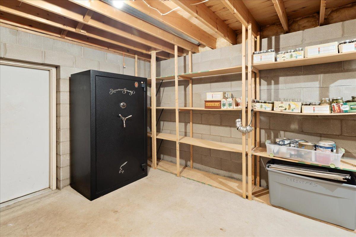 Storage for the Things You Want Nearby Built-in shelving provides organized space for household supplies, seasonal belongings, and lake-life essentials.