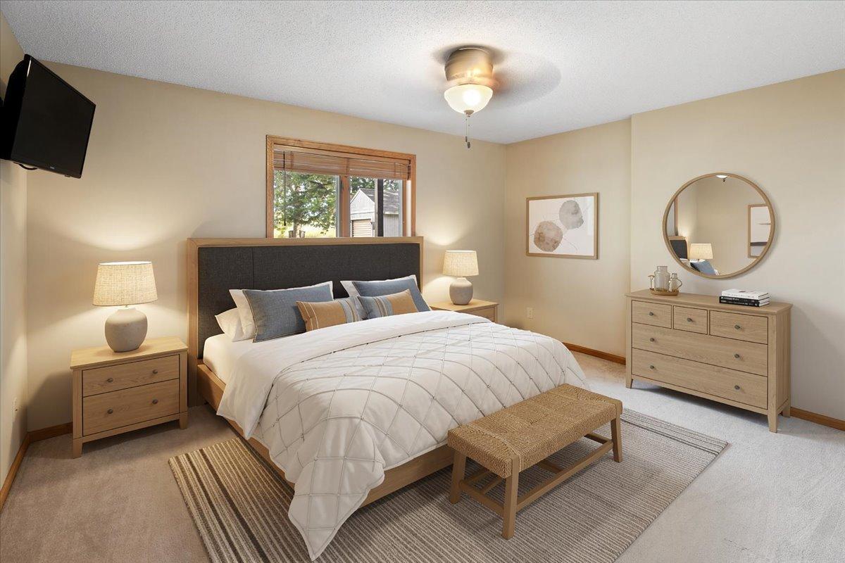 See the Possibilities Virtually staged to demonstrate scale, this flexible room comfortably accommodates a full bedroom arrangement while preserving open space.