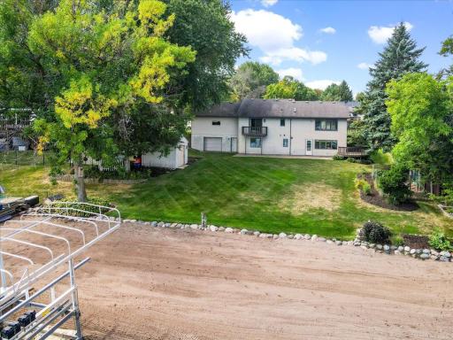 Designed Around the Lake Lifestyle A balcony, deck, patio, workshop, storage shed, and level lawn make the waterfront easy to enjoy.