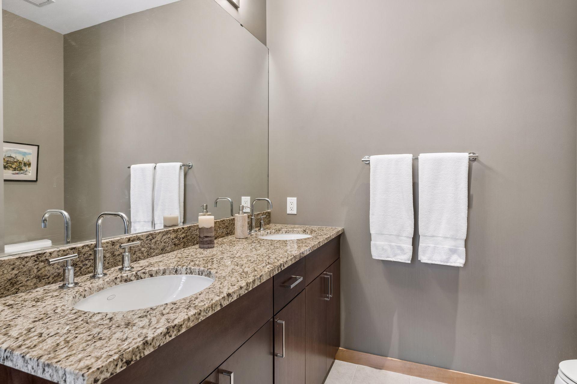 Primary Private Bathroom with His & Her Sinks