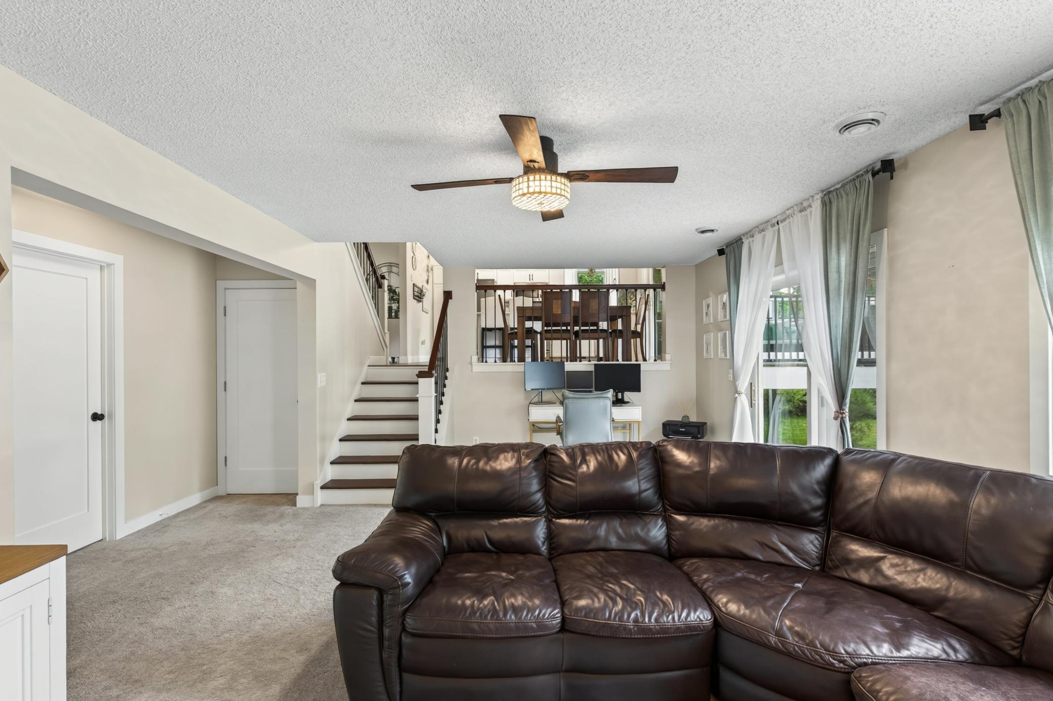 Down the stairs to the LL Family room, bathroom, mud room and 4th bedroom