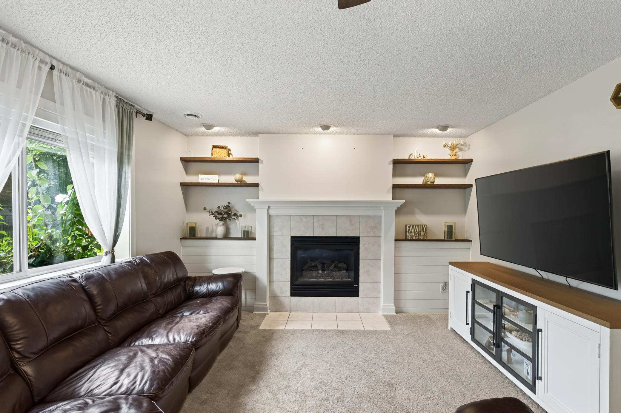 Stunning gas fireplace with new mantel