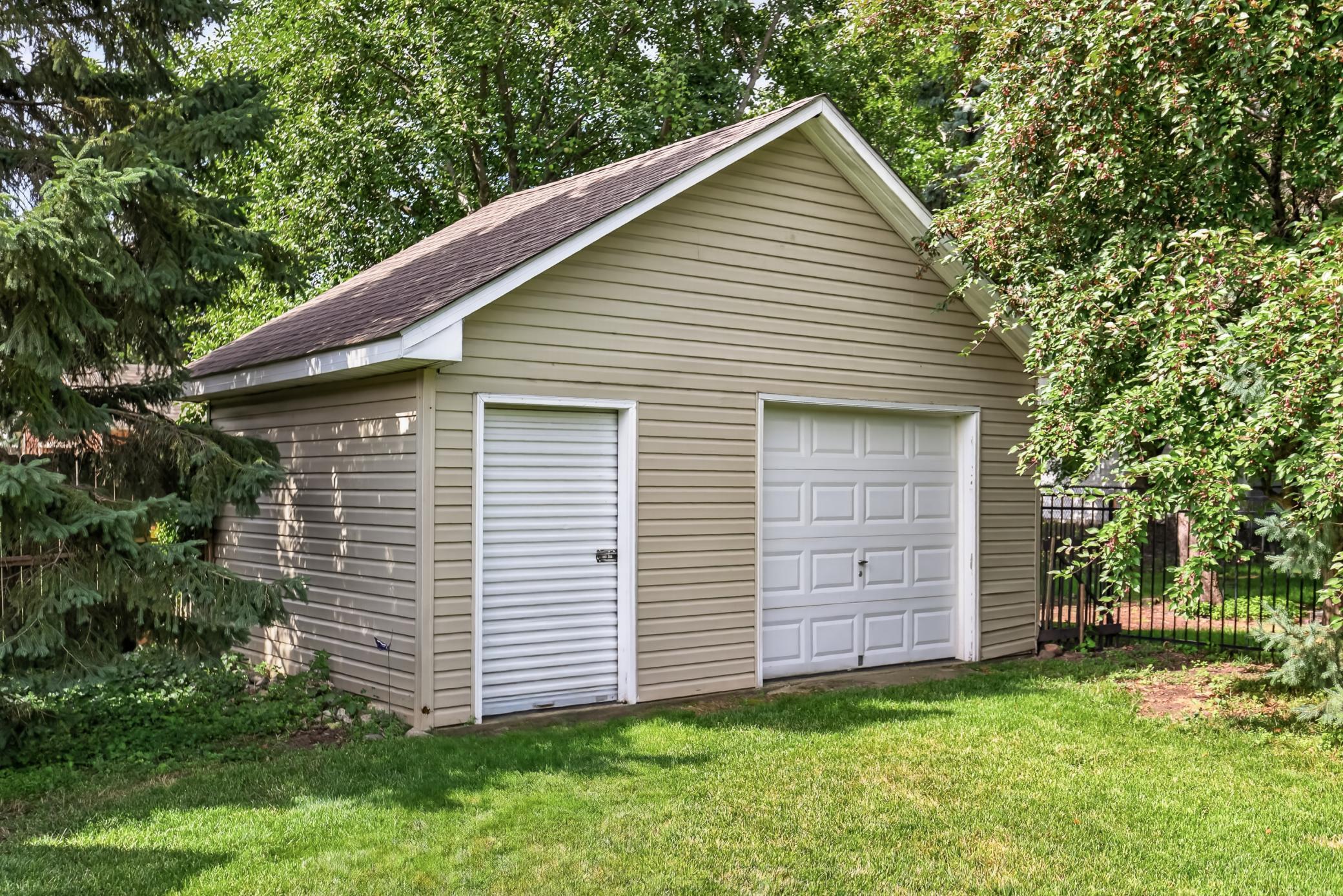 Shed with garage stall