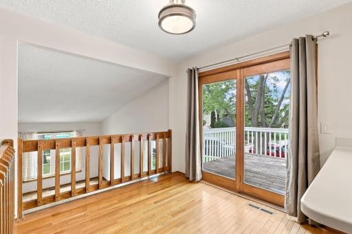 Walk out to spacious deck perfect for enjoying morning coffee or evening dinner!