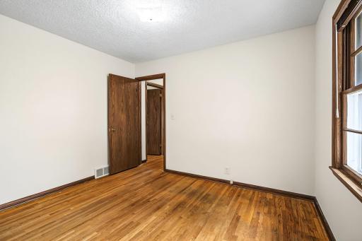 Bedroom 1, has two entrances that make it a perfect flex room. Imagine it being transformed into a semi-formal dining room or office with a full wall of windows or sliding glass door.