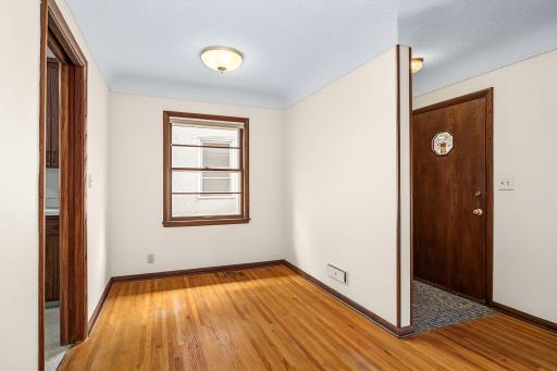 The formal dining area can also serve as a home office/den or reading nook.