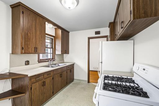 Well appointed kitchen with abundant cabinetry and counterspace.