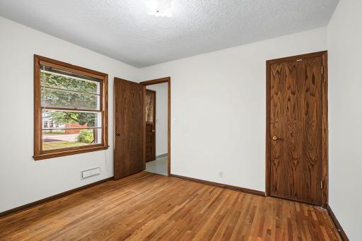 Bedroom 1, is one of three versatile bedrooms on this homes main level.