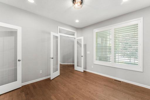 French glass doors lead into the main level office. A perfect work-from-home setup, but equally suited for a hobby space, sitting room, or whatever fits your lifestyle.