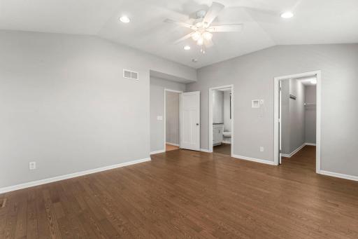 Upstairs, the primary suite offers updated wood flooring, a spacious 13x5 walk-in closet, and a beautifully updated private bath.