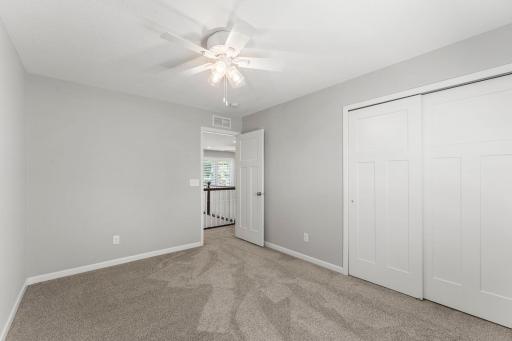 Two additional bedrooms on the upper level.