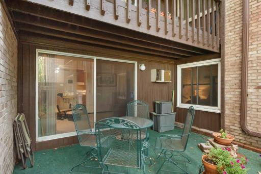The shaded patio provides a comfortable outdoor retreatâperfect for morning coffee or relaxing at the end of the day.