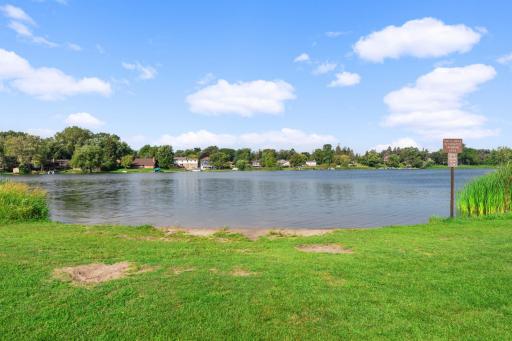 Enjoy scenic views of Twin Lake with walking trails, fishing opportunities, and beautiful natural surroundings.