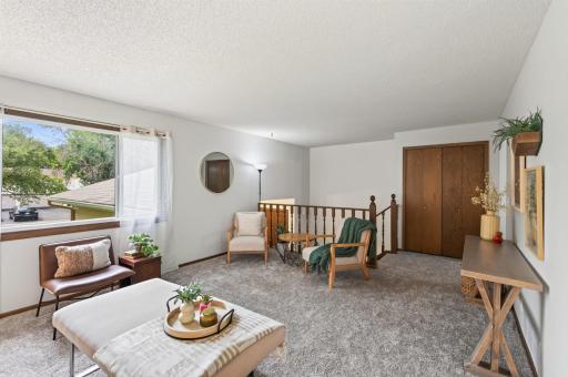 This inviting space offers plenty of space to enjoy the with friends or family.