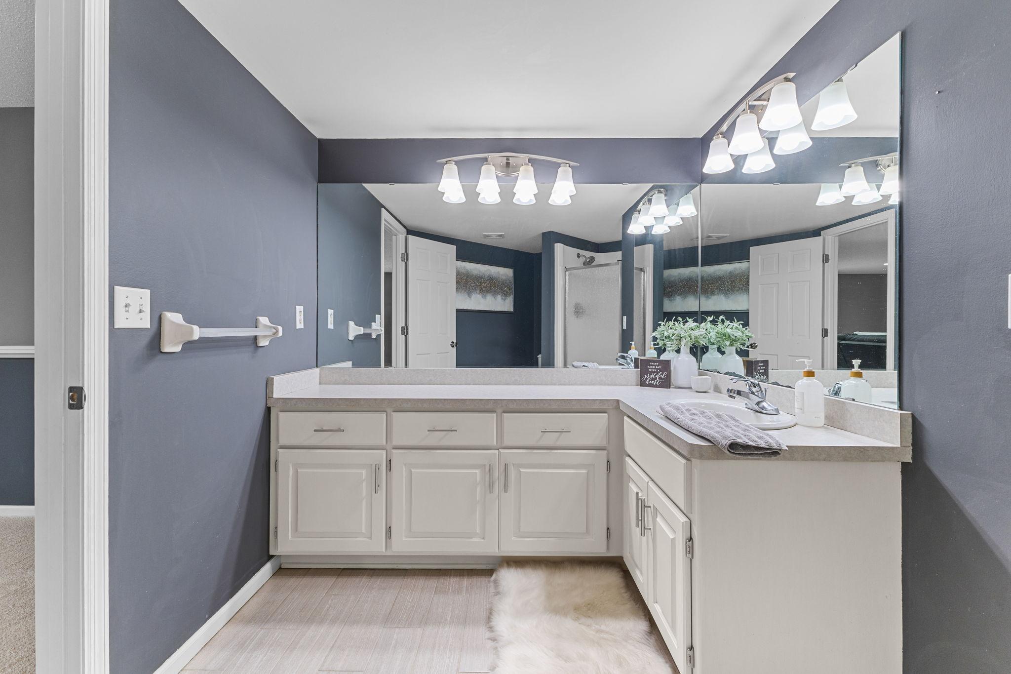 The large vanity provide plenty of room to get ready each morning.