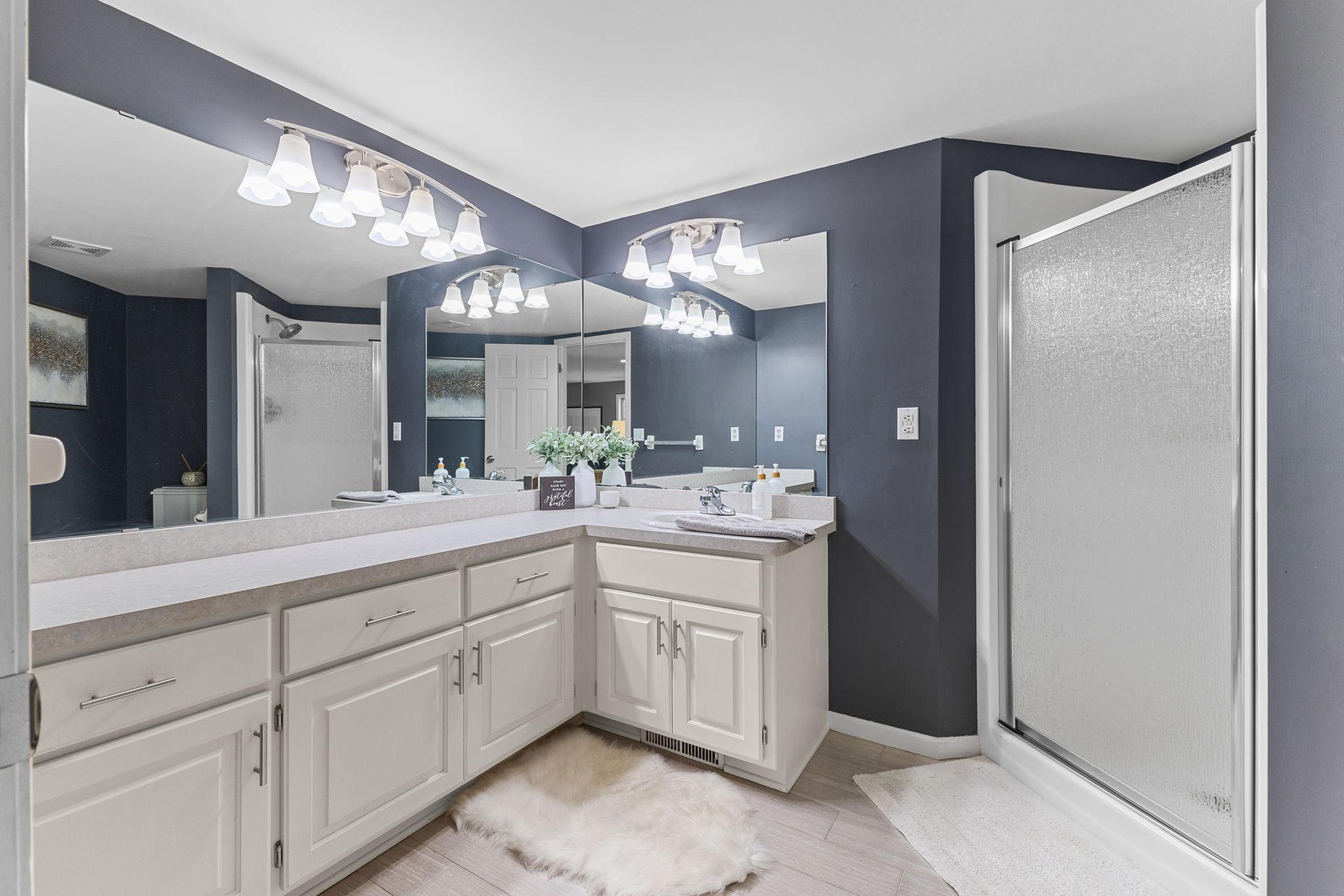 An additional full bathroom adds convenience for family and guests alike.