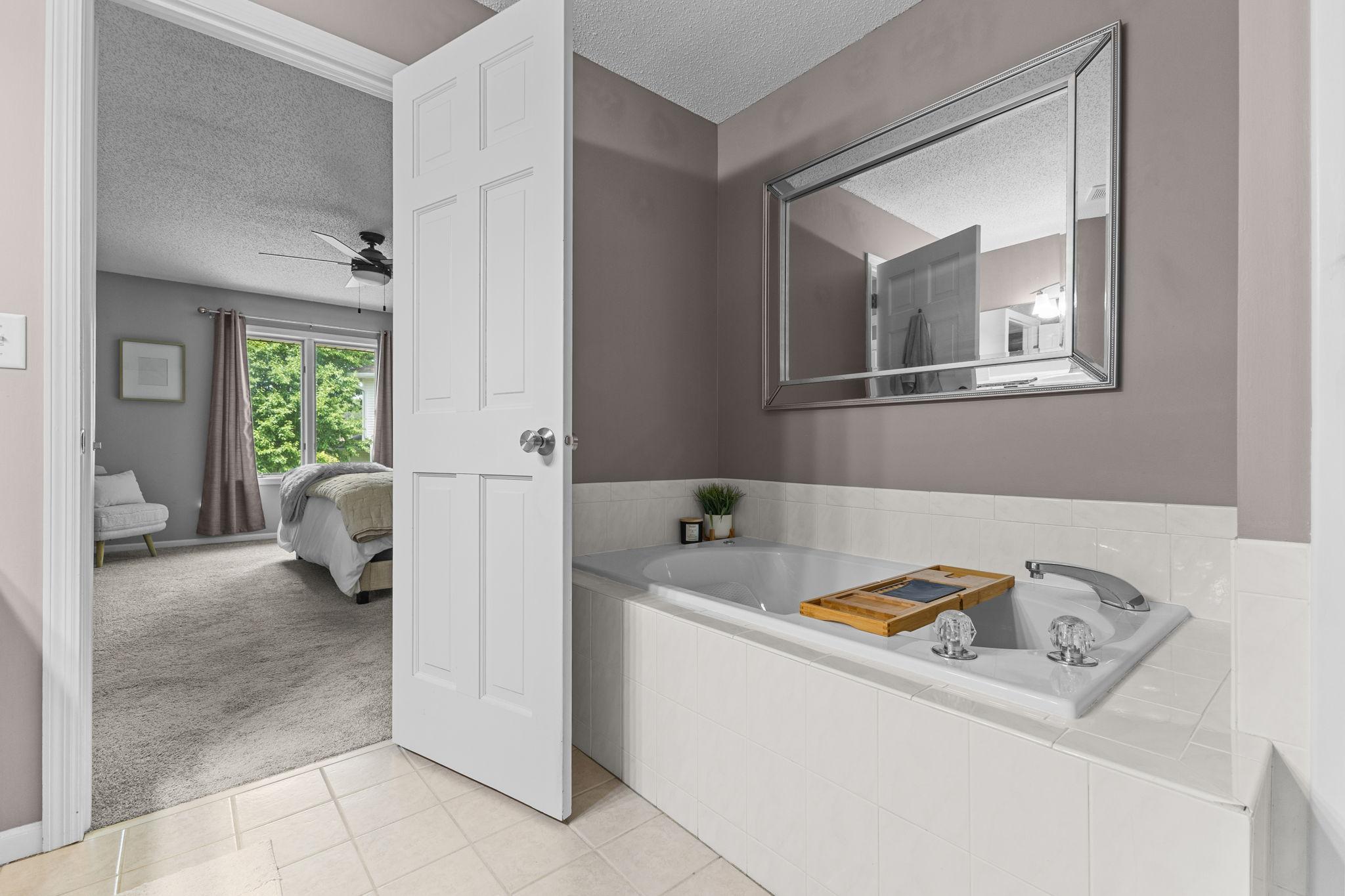 Soak away the day in the luxurious jetted tub separate from the walk in shower.