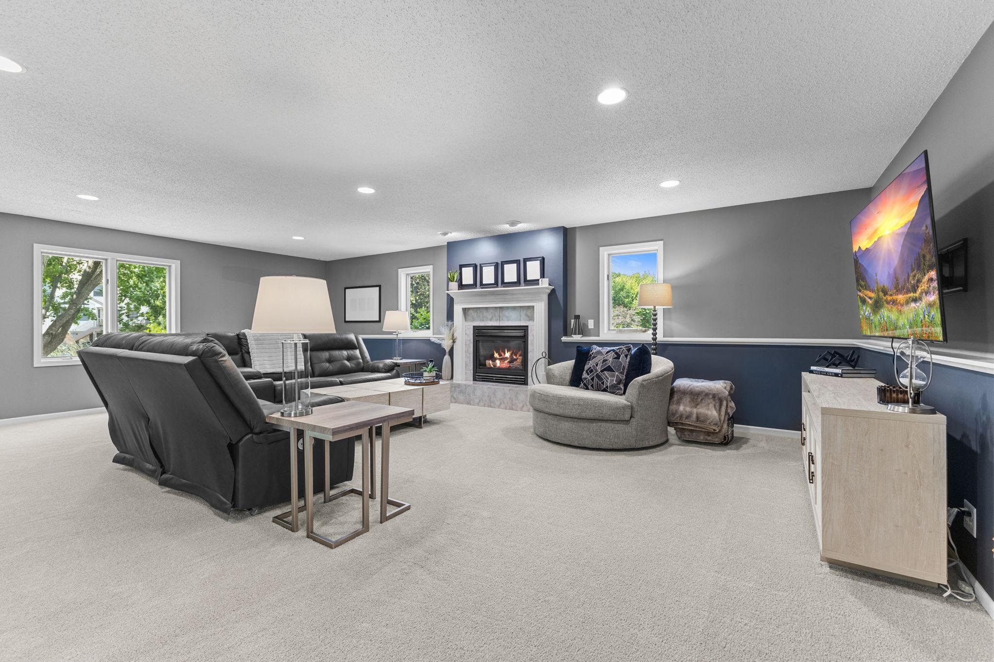 A spacious family room with plenty of room for everyone to spread out.