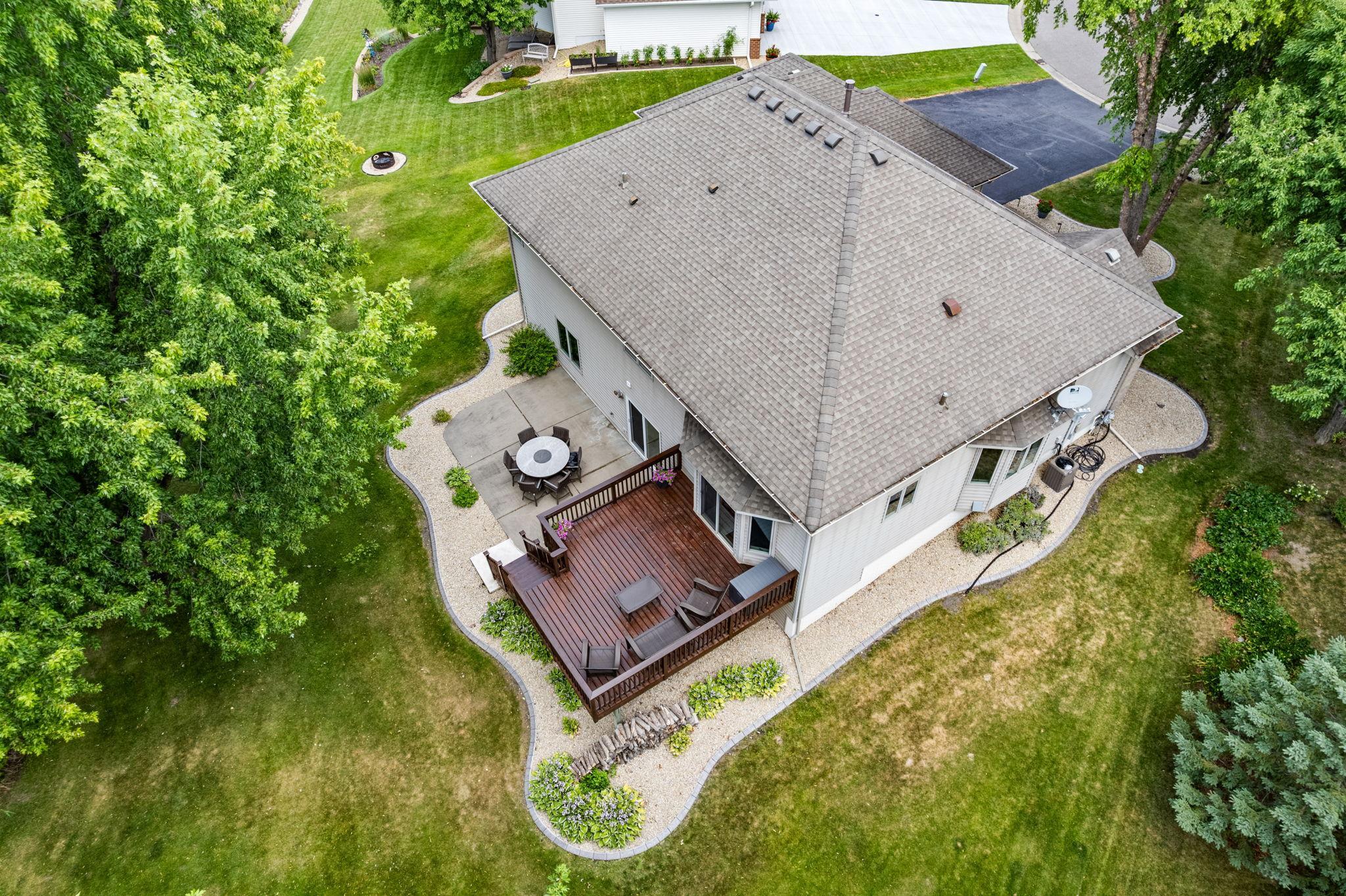An aerial perspective showcases the impressive backyard and outdoor living spaces.